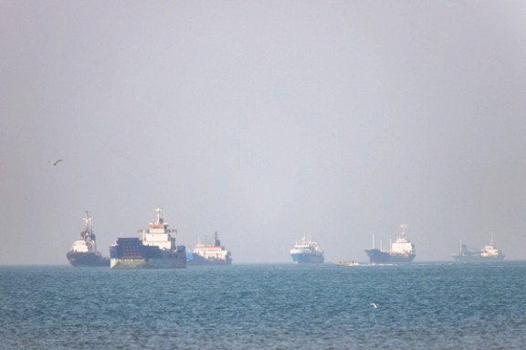 Ships sail near the Strait of Hormuz, where tanker attacks on Tuesday prompted the United States to revoke a short-lived authorization for Iranian oil sales.