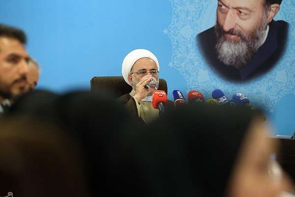 Sons of Iran's ex-judiciary official jailed for over 25 years in corruption scandal