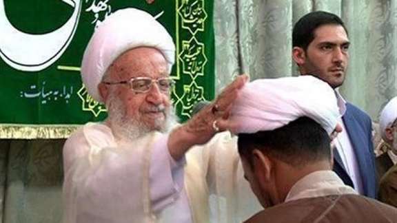 A young seminarian receiving his turban at his graduation. Undated