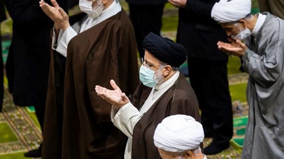 Iran's President Ebrahim Raisi praying on Friday November 12, 2021
