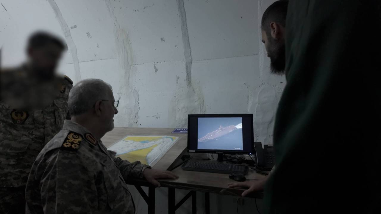 IRGC commander Pakpour monitors a US destroyer on screen at a naval base in southern Iran