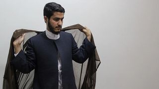 Iran's Shiite Clerics Seek Low Profile, Shun Turbans And Cloaks