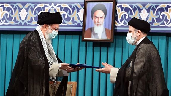 Raisi receiving his presidential approval document from Iran's ruler Ali Khamenei. August 3, 2021