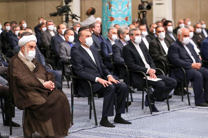 Iran's foreign minister Hossein Amir-Abdollahian and nuclear negotiator Ali Bagheri-Kani listening to Khamenei on May 20, 2023