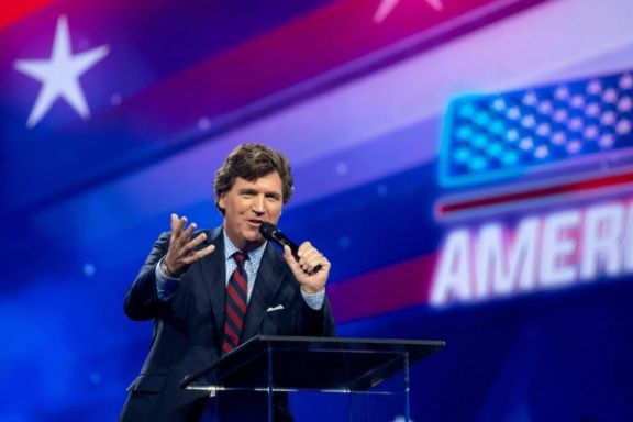 Tucker Carlson speaks as conservative leaders and personalities attend Turning Point USA's AmericaFest 2023 in Phoenix, Arizona, US December 18, 2023.