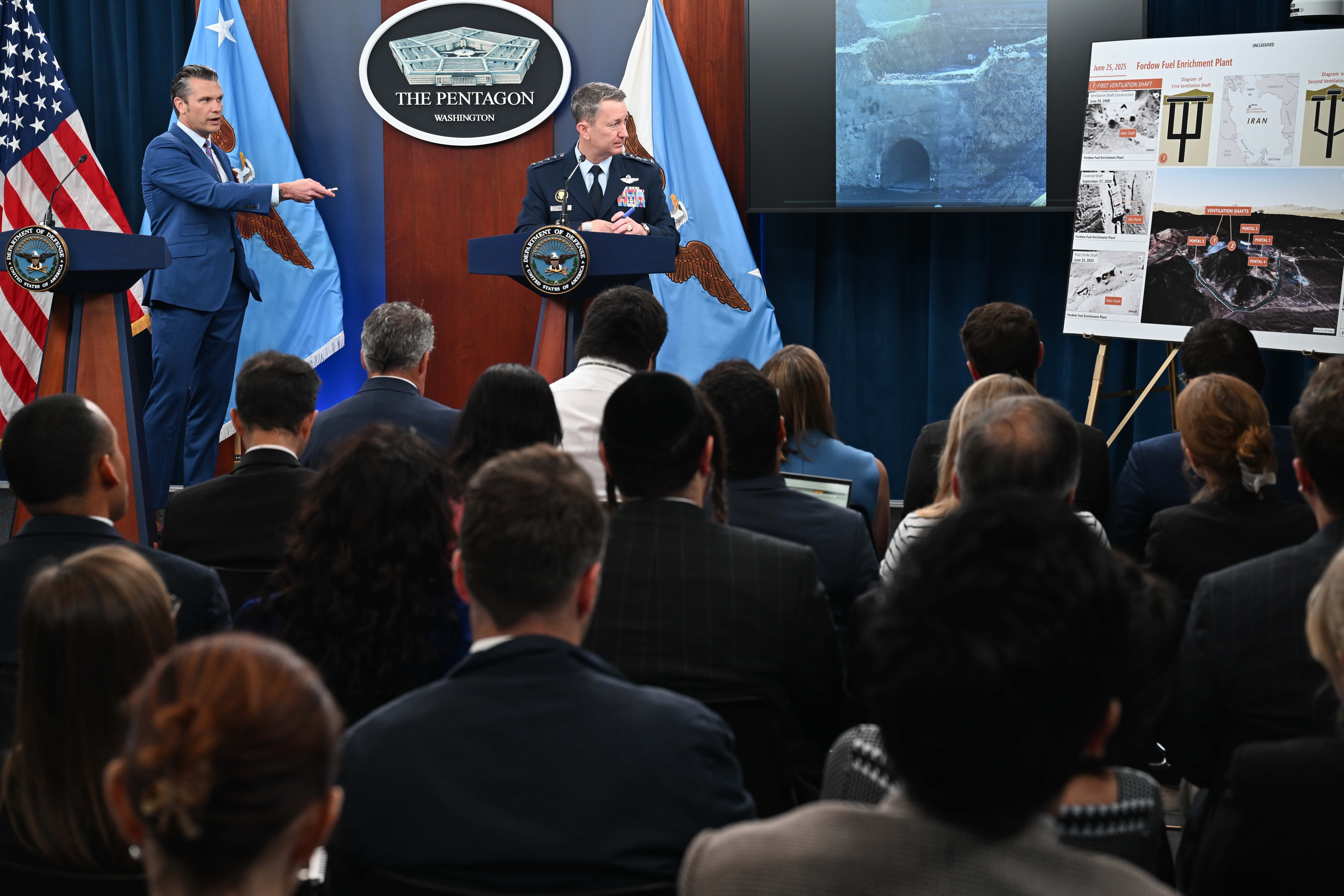  Defense Secretary Pete Hegseth and Air Force Gen. Dan Caine, chairman of the Joint Chiefs of Staff, conduct a press briefing at the Pentagon, June 26, 2025