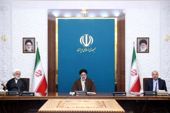 Iran’s Chief Justice Gholam-Hossein Mohseni-Ejei (left), President Ebrahim Raisi (center), and Parliament Speaker Mohammad-Bagher Ghalibaf during a Security Council meeting