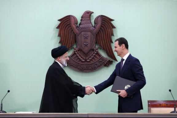 Iranian President Ebrahim Raisi (left) and Syrian President Bashar al-Assad during a meeting in Damascus on May 3, 2023