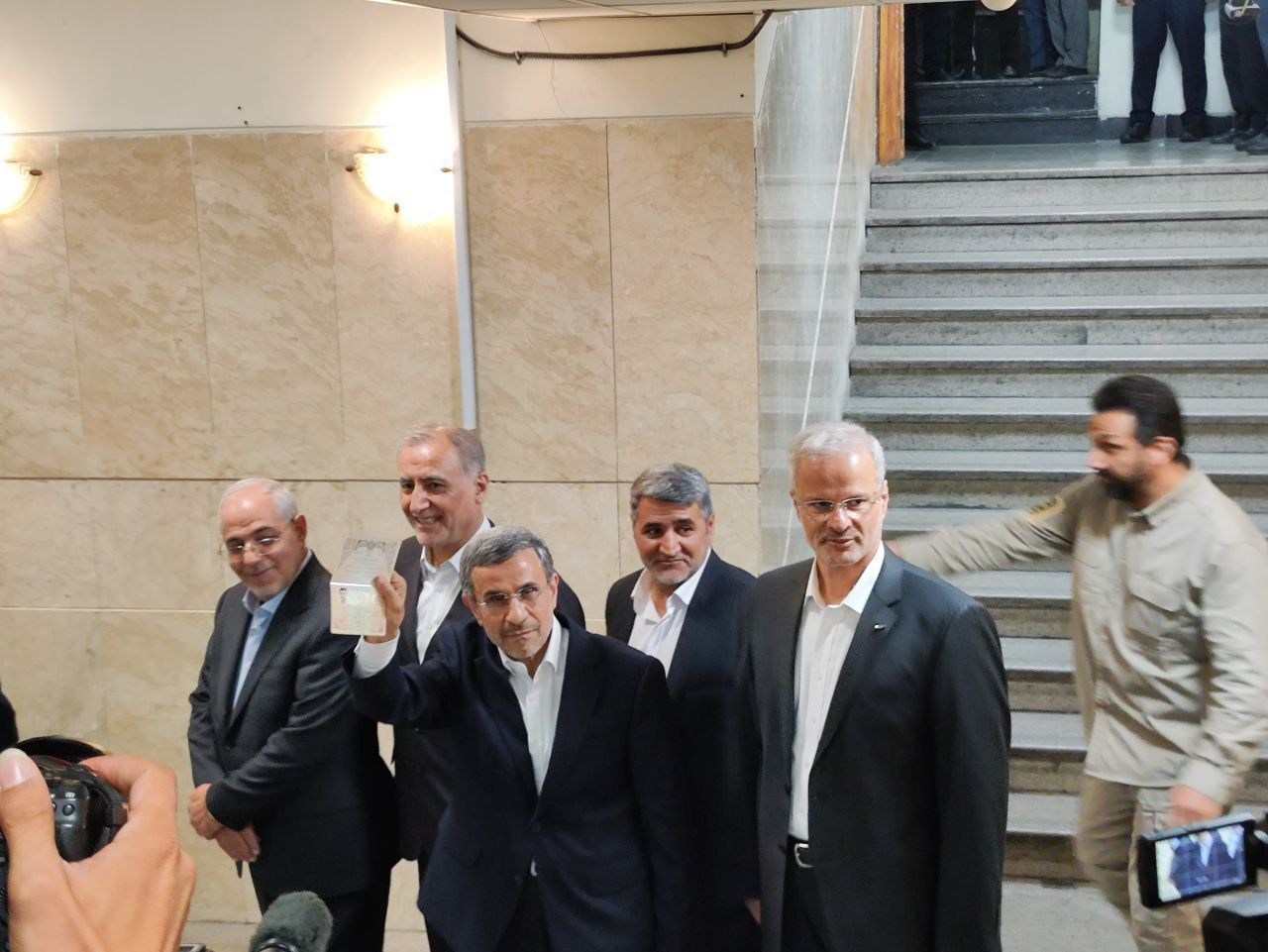 Ahmadinejad arriving accompanied by former aides to register candidacy. June 2, 2024