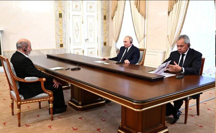 Putin hosts Iran's security chief as West sanctions Tehran over missile transfer