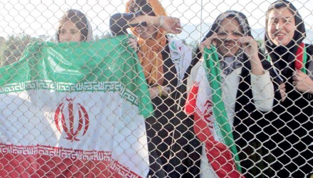 Women held behind the fences, not allowed to enter the stadium to watch a match. March 29, 2022