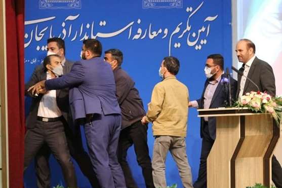 Man who slapped Governor Abedin Khorram being restrained. October 23, 2021