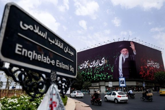 A billboard in Tehran's central Enghelab (Revolution) square, featuring supreme leader Ali Khamenei and his post-war patriotic messaging
