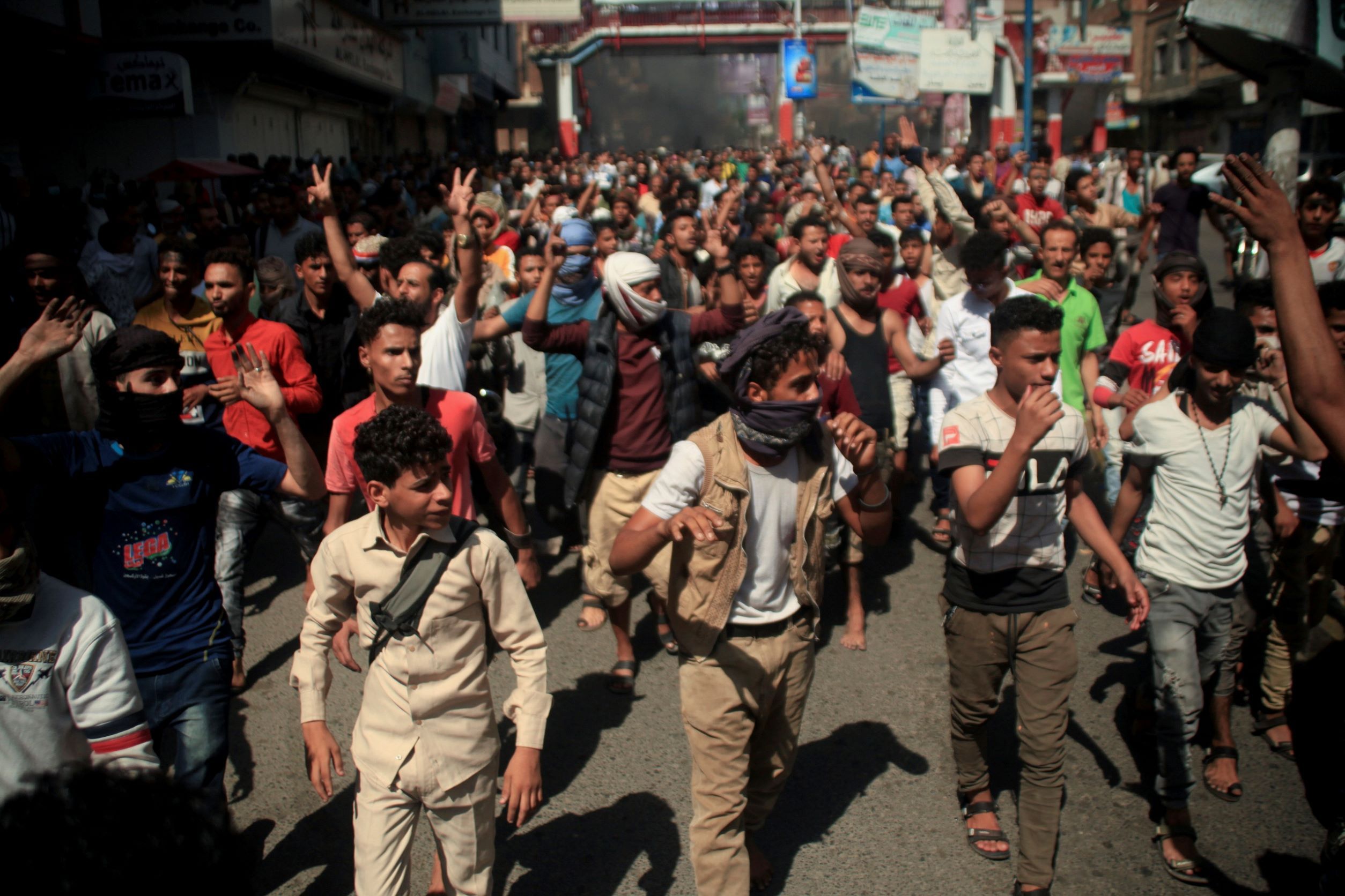 People demonstrate against the deteriorating economic situation and the devaluation of the local currency, in Taiz, Yemen September 27, 2021.