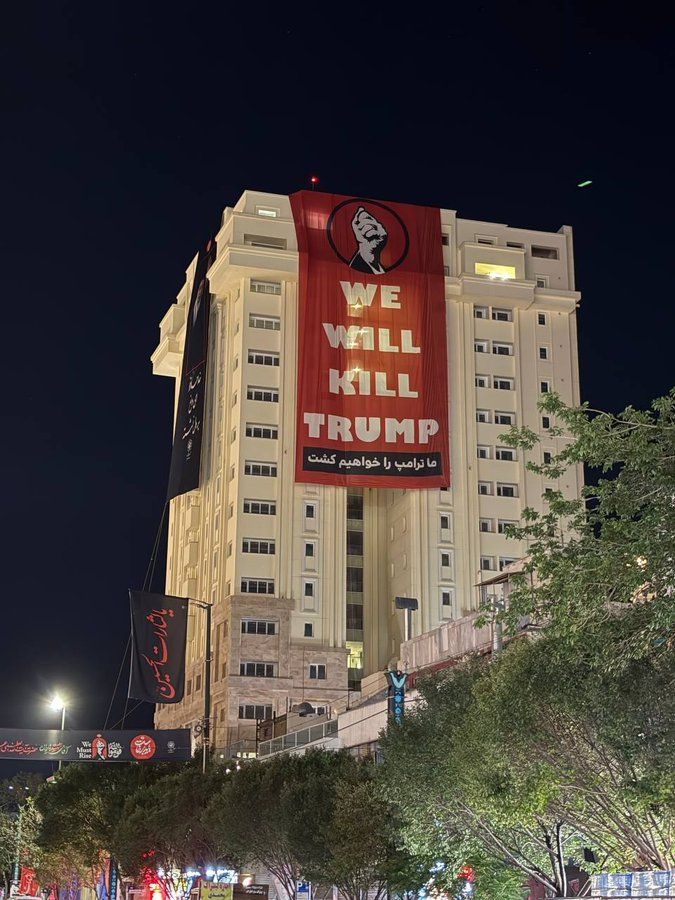 Banner threatening Trump appears on hotel in Mashhad