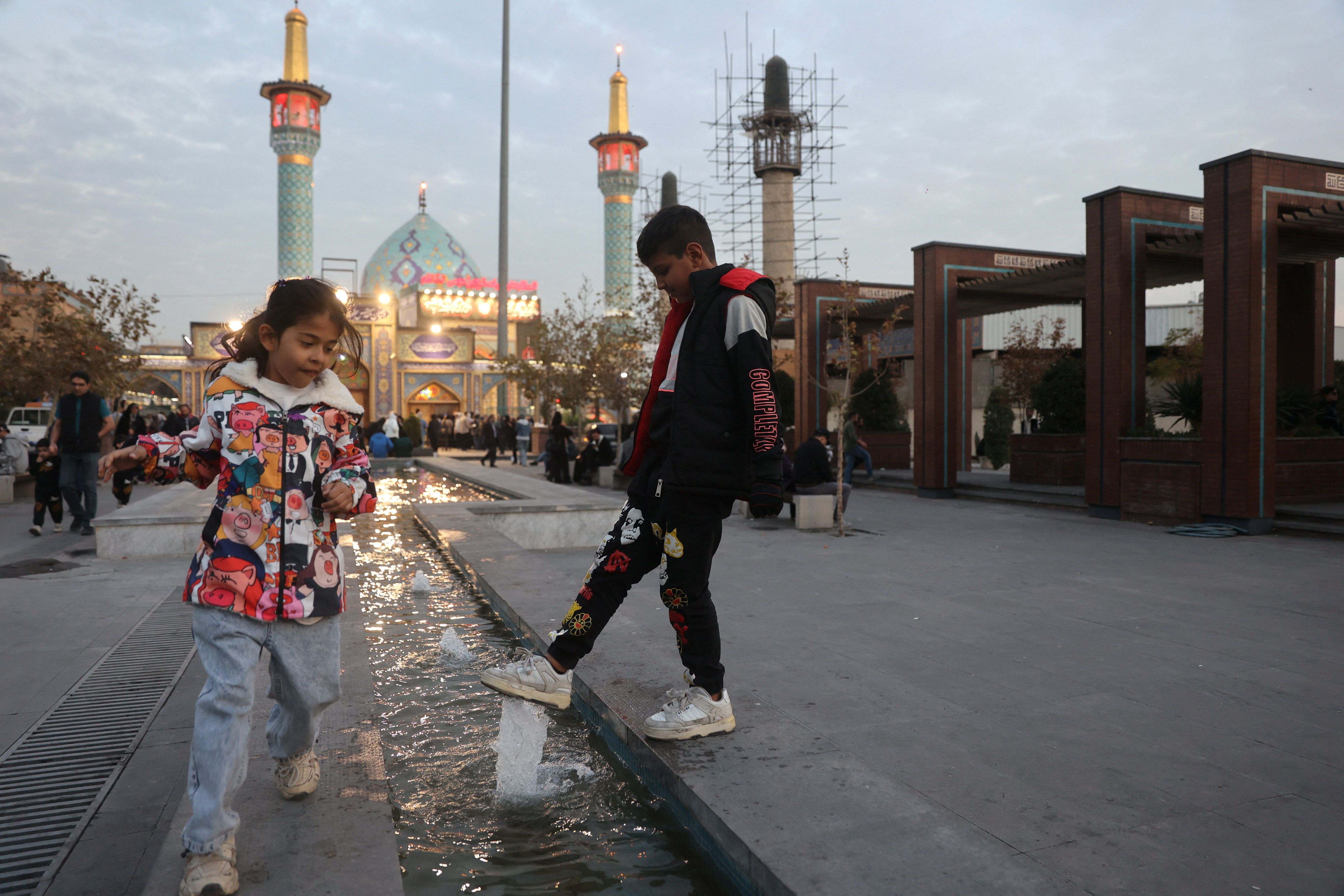 Children play in Tajrish Bazaar in Tehran, Iran, November 14, 2025. 