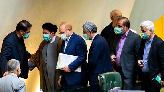 Speaker of parliament Mohammad Bagher Ghalibaf (3rd from L) and lawmakers