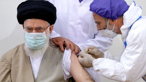 Ali Khamenei receiving what was said to be his Barakat vaccine.