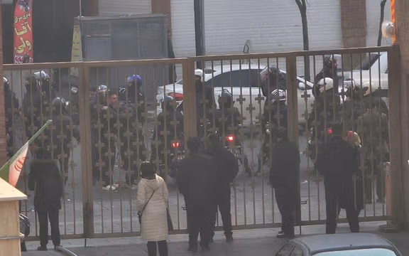 As protests spread in Iran, official denial deepens