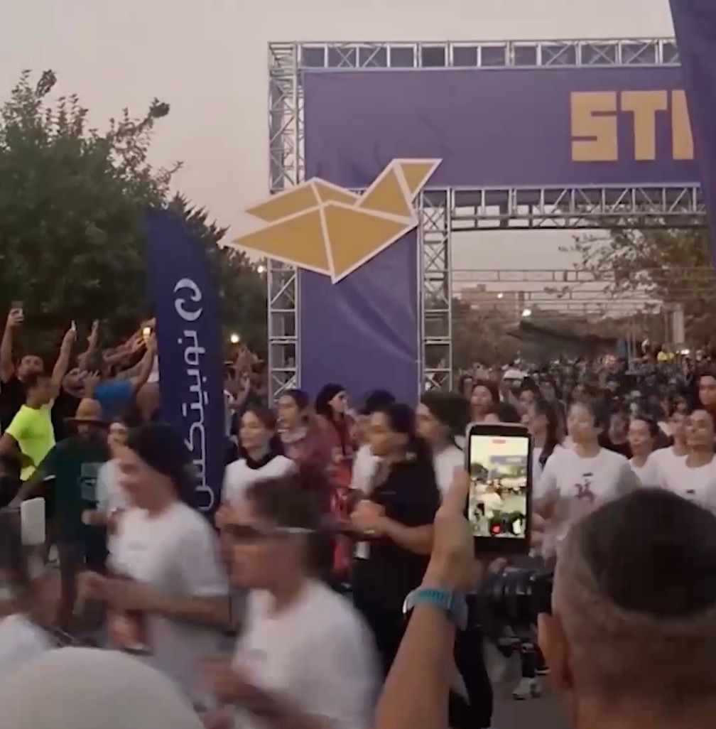 Unveiled runners draw attention at Tehran 10k race