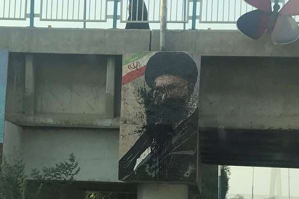 Soccer Fans Tear Down Khamenei, Soleimani Banners In Iran