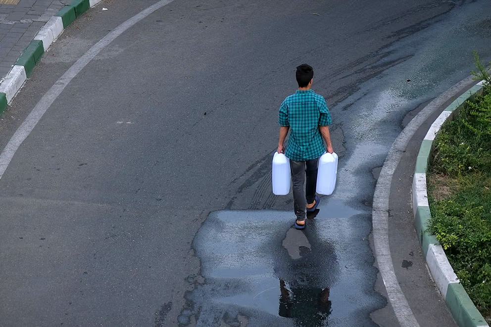 Tehran residents urged to buy water tanks as outages spread across Iran