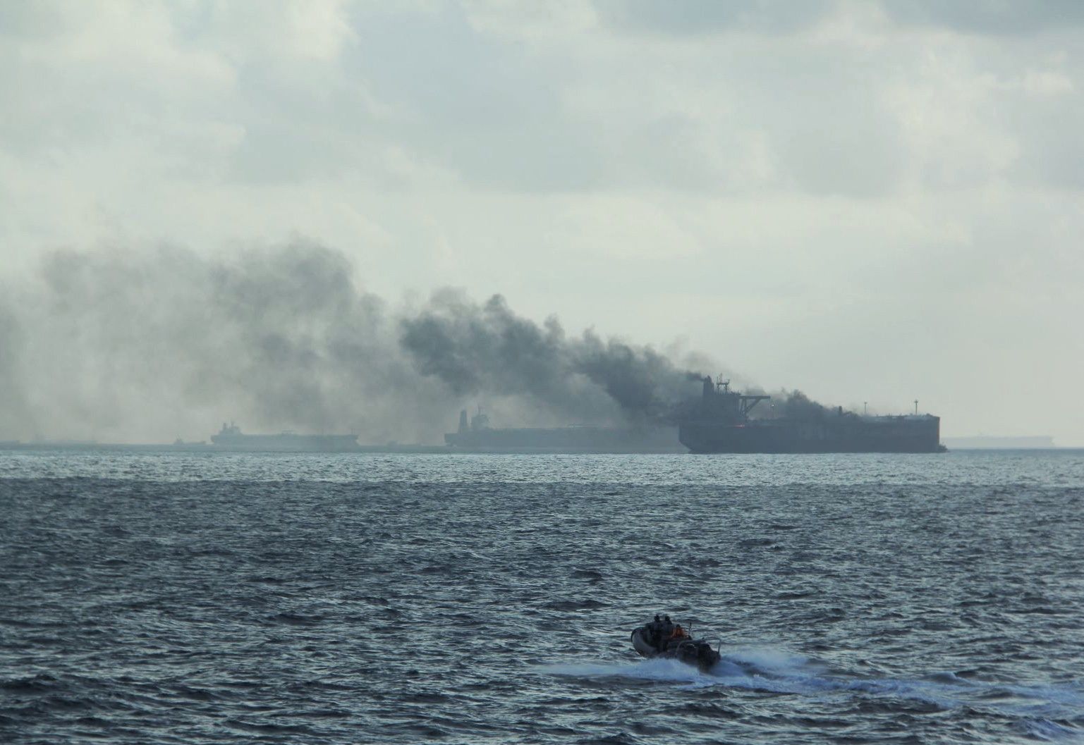 Burning vessels following a fire on two oil tankers about 55 km (34 miles) northeast of the Singaporean island of Pedra Branca, July 19, 2024.