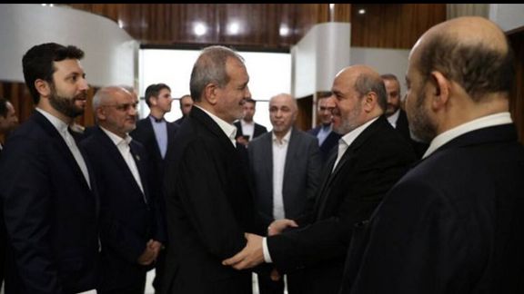 Iran’s President Masoud Pezeshkian (left) meeting Hamas officials in Doha on October 2, 2024.