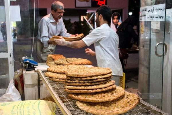 Bread Price Hikes Force Iranians To Buy Half Loaves