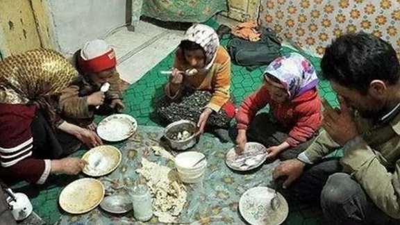 A glimpse into the harsh realities of workers' lives in Iran, where families struggle to afford basic necessities amid soaring inflation and economic hardship.