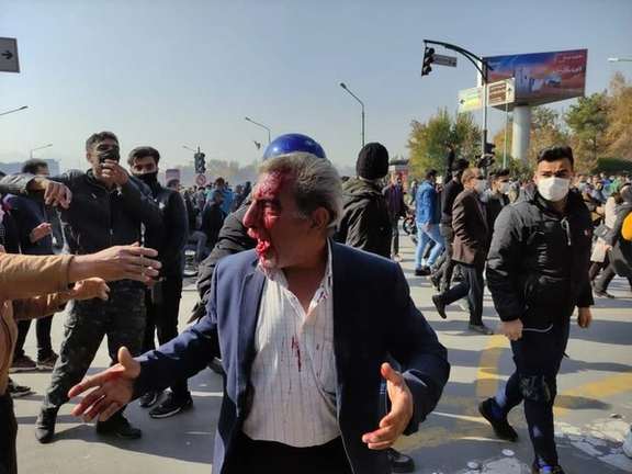 A man with blood on his face in Esfahan on November 26, 2021
