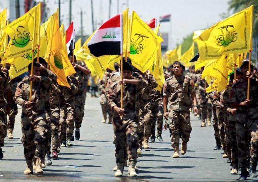 Iraqi Shiite Muslims from the Popular Mobilization Units (Hashd al-Shaabi) march during a parade marking the annual Quds Day, or Jerusalem Day, in Baghdad, Iraq, June 23, 2017.   