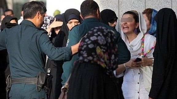 Hijab patrols confronting a woman