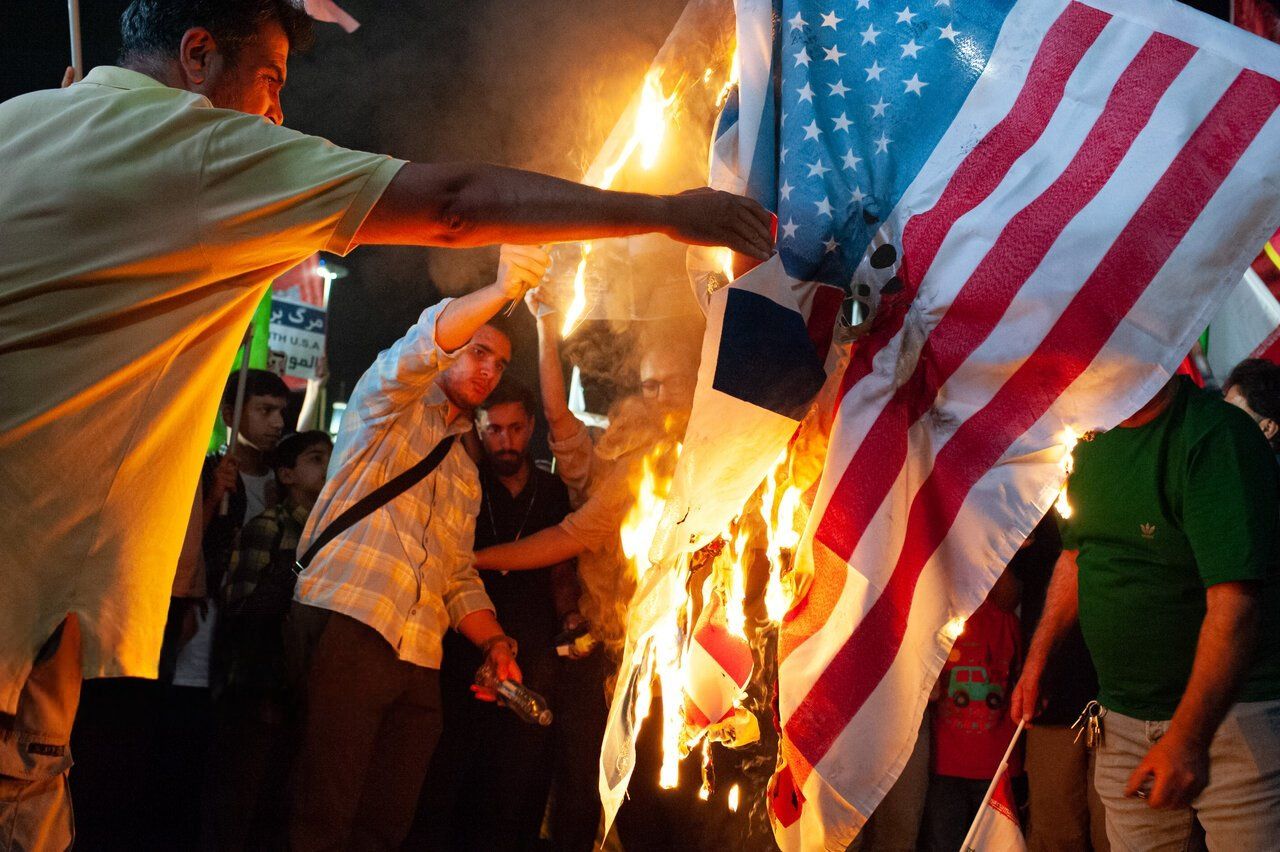 Tehran moderates urge US talks to avert collapse, hardliners cry betrayal