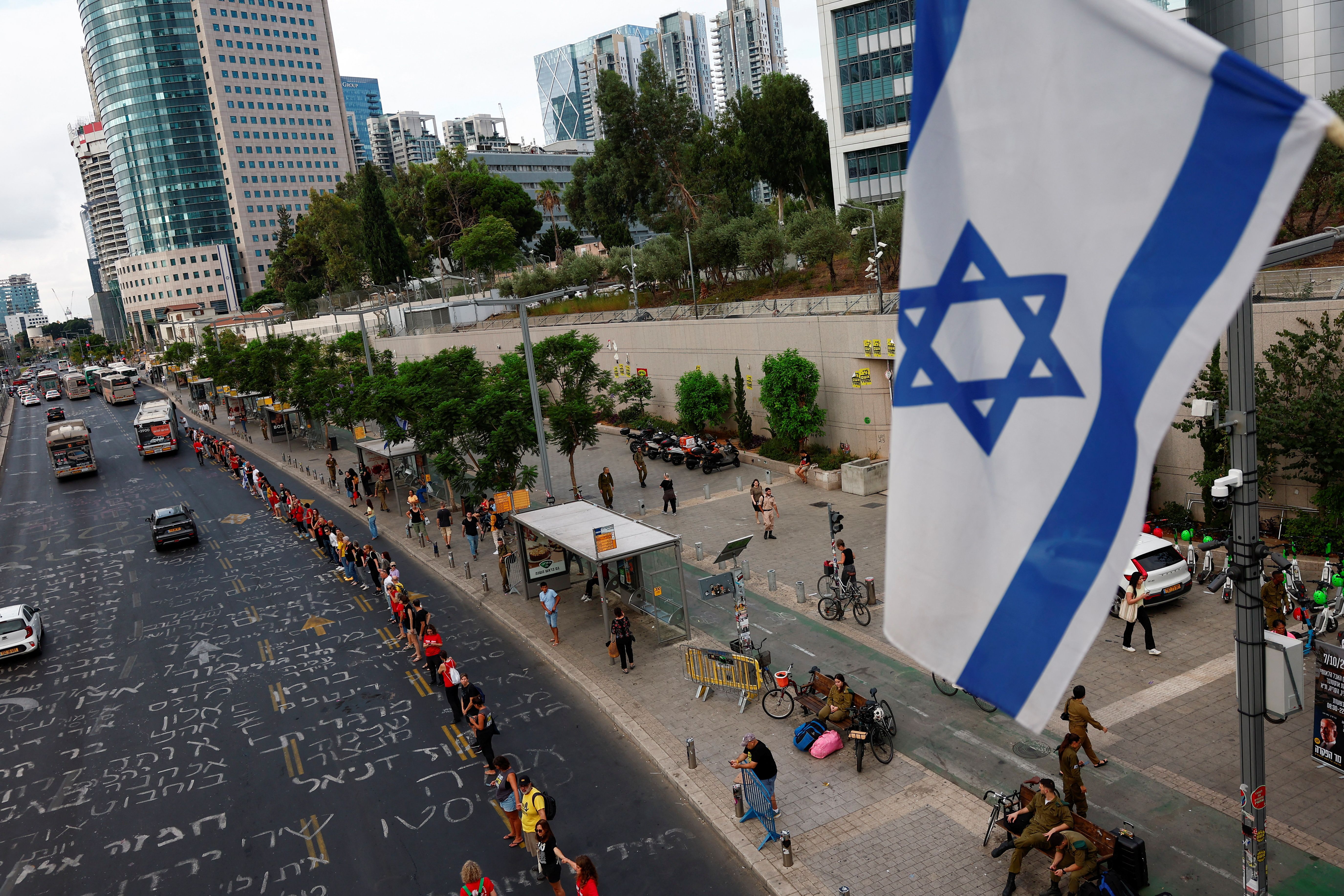 Israelis gather to mark one year since the deadly October 7 attack by Hamas, in Tel Aviv, Israel, October 7, 2024.