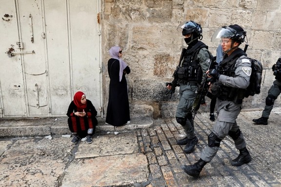 Israeli security personnel patrol an alley in Jerusalem's Old City April 17, 2022.