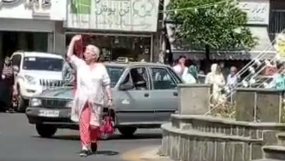 People Prevent Police From Arresting Woman Protesting Hijab In Iran