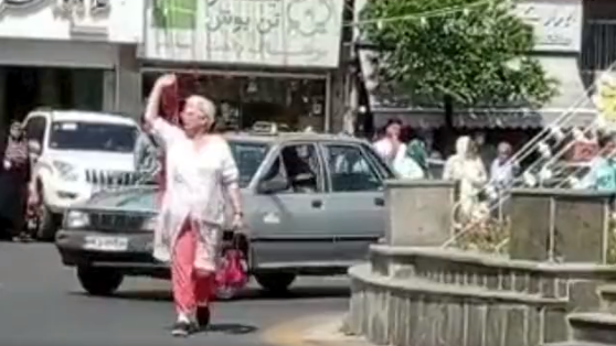 People Prevent Police From Arresting Woman Protesting Hijab In Iran