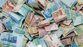 Under President Raisi, Iran's Central Bank Doubles Banknote Printing