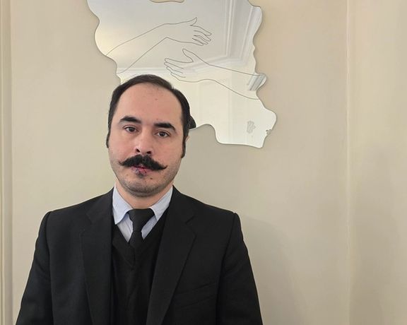 Outspoken Iranian activist sews lips shut, stages silent sit-in