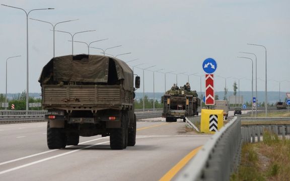 A military column of Wagner private mercenary group drives along M-4 highway, which links the capital Moscow with Russia's southern cities, near Voronezh, June 24, 2023