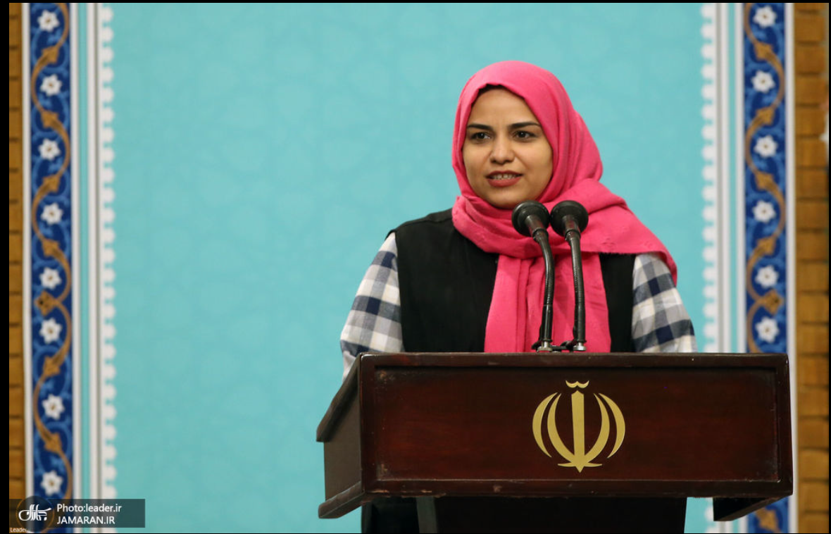 A woman speaking during a meeting of supporters with Khamenei