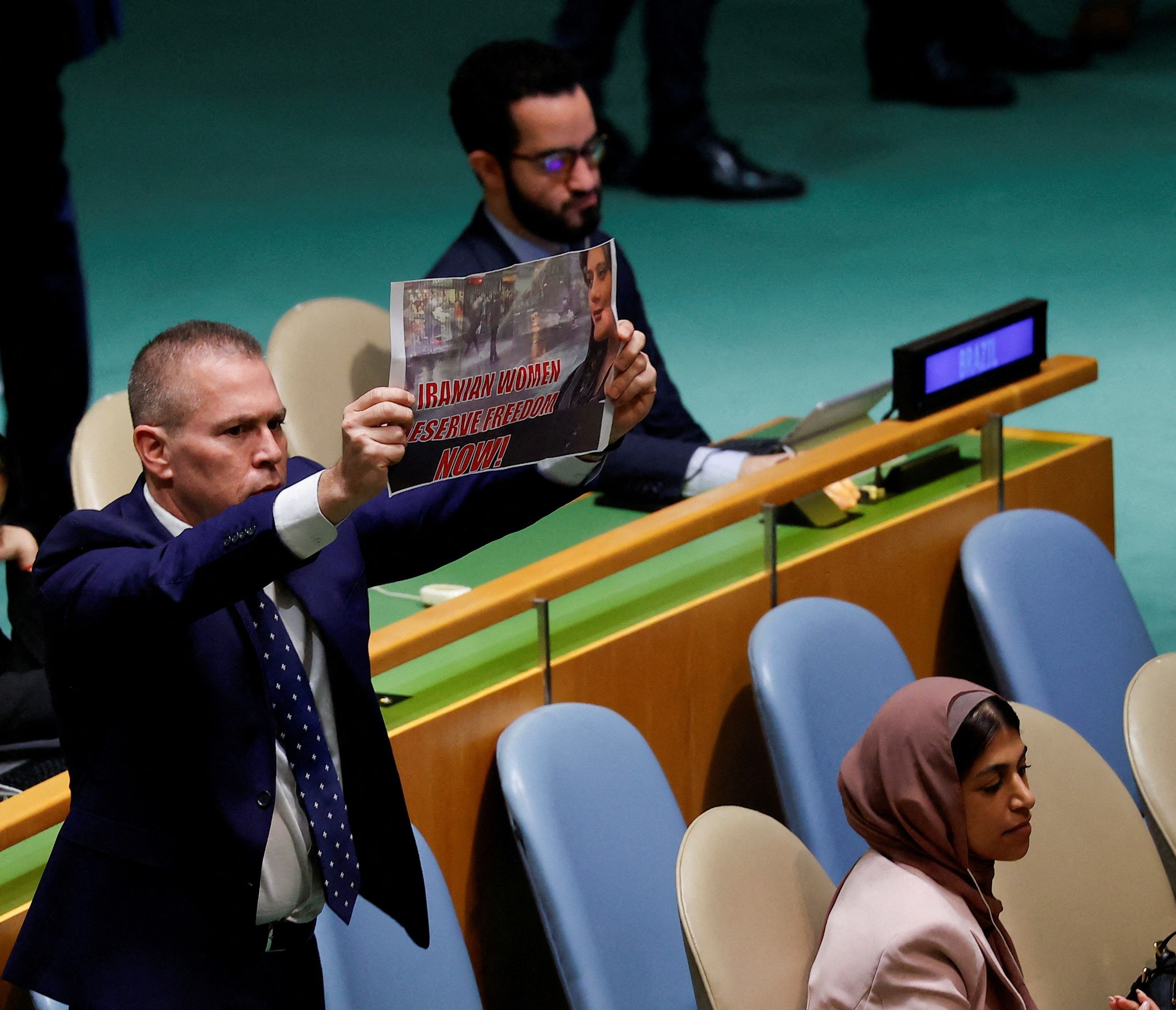 Israeli Envoy Uses Iranian Protester's Sign to Denounce Raisi At UN