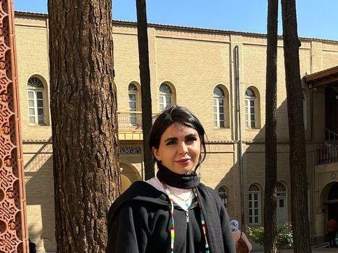 Artemis Ghasemzadeh standing in front of a Vank Church in Isfahan, Iran.