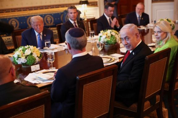 Israeli Prime Minister Benjamin Netanyahu looks on during a bilateral dinner with US President Donald Trump, at the White House in Washington, July 7, 2025.