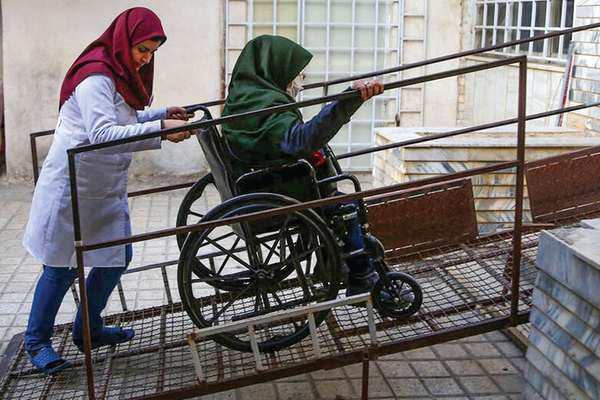 Iran cuts living allowances for many people with disabilities