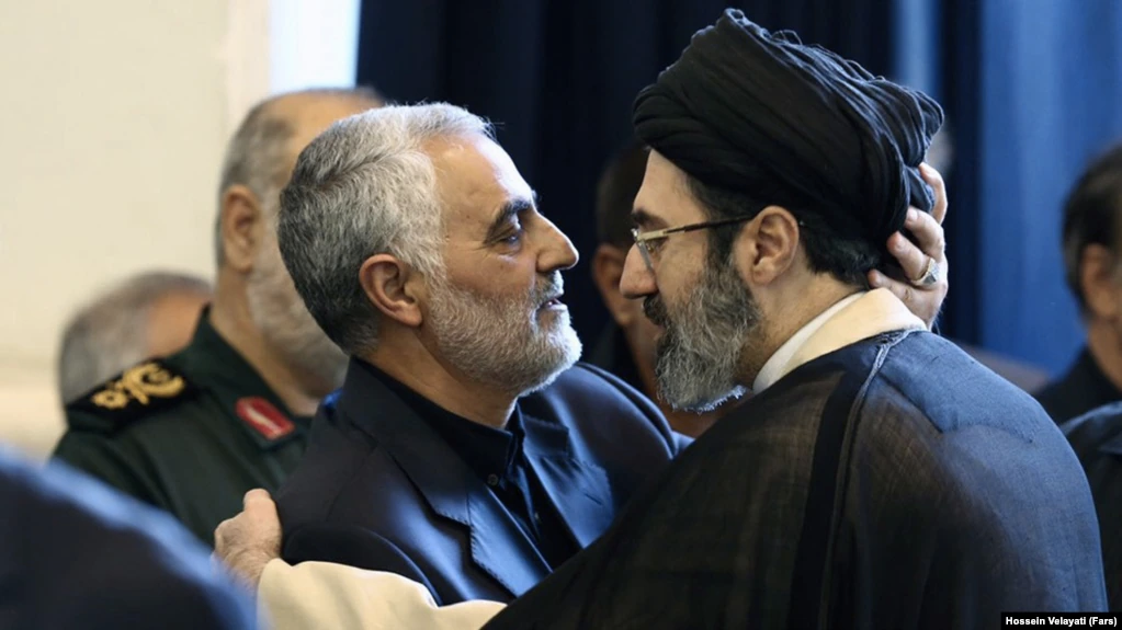 Mojtaba Khamenei seen greeting former Qods Force commander Qasem Soleimani. Undated
