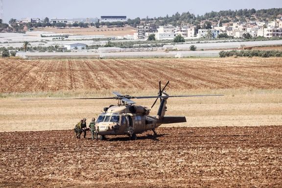 sraeli military carry a wounded person on a stretcher to a helicopter during a raid on Jenin refugee camp near Salem checkpoint, the entrance from Israel to Jenin in the West Bank, July 3, 2023