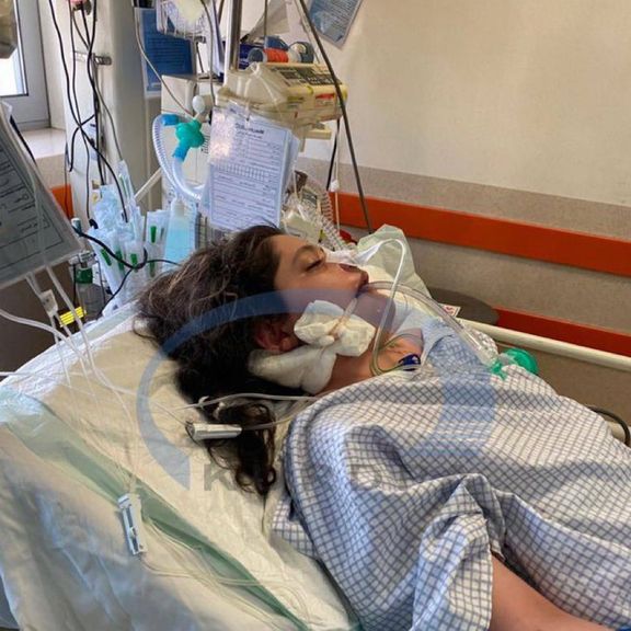 Mahsa Amini in her hospital bed while bleeding from her right ear shows head trauma. Sept. 15, 2022