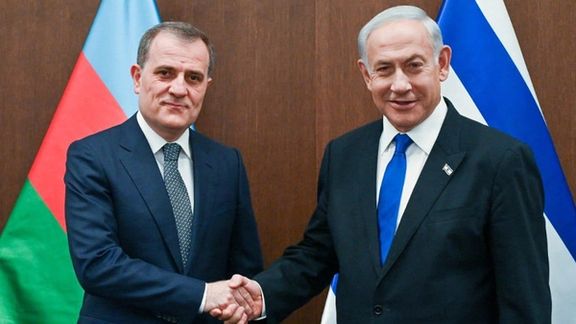 Azerbaijan Foreign Minister Jeyhoun Bayramov (left) and Israeli Prime Minister Benjamin Netanyahu in in Jerusalem on March 29, 2023